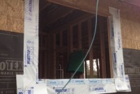 Proper Window Installation using self adhered membrane flashing and weather resistant barrier, new construction home