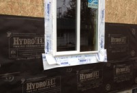 Proper Window Installation using self adhered membrane flashing and weather resistant barrier, new construction home